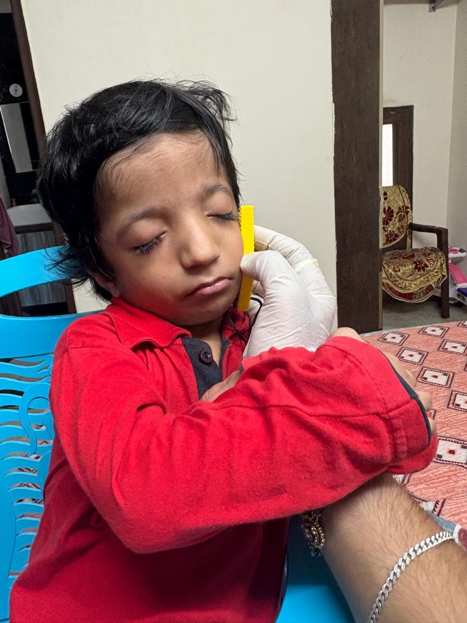 Hands-on therapy session with a child at Positive Zone